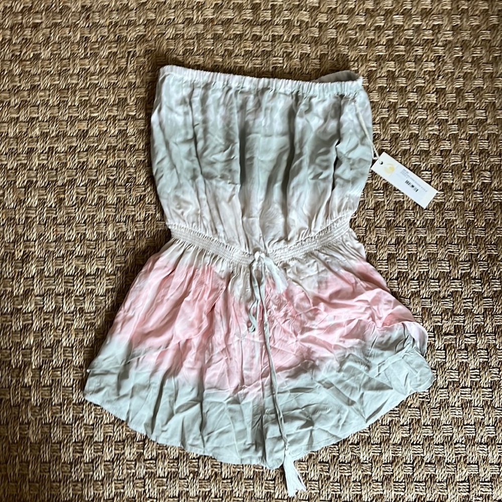 Adorable never used tickets on! Romper
